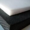 1.7 pound and 2.2 pound density white and black stacked sheets of polyethylene PE foam sheets