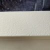 5 Close-up of a urethane and polyuria hard coat finish showing the orange peel effect of the coating