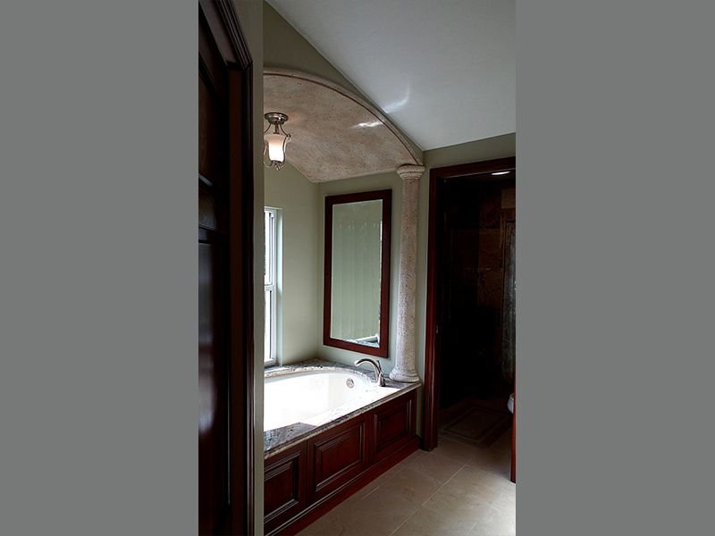Architectural foam trim columns used in bathroom on ceiling and walls