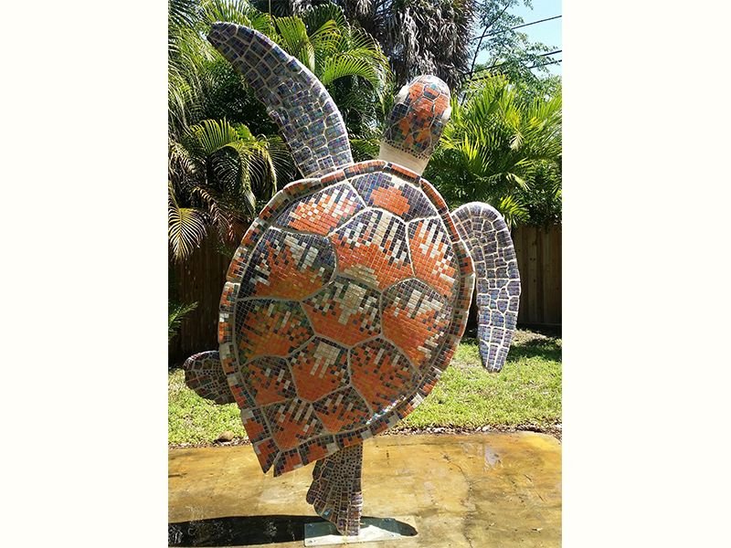 Art sculpture of a turtle made from carved EPS expanded polystyrene foam Styrofoam covered by tiles