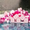 EPS Styrofoam expanded polystyrene floating letters in a pool spelling BABY for a party