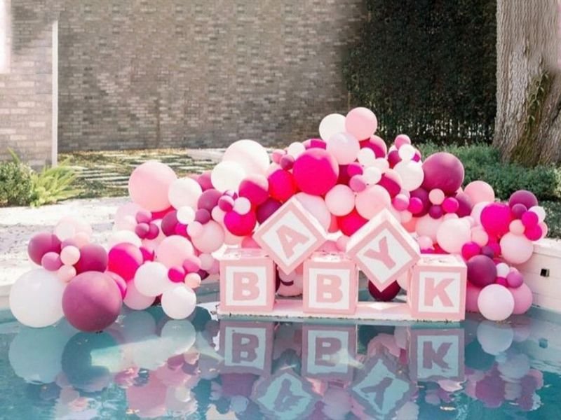 EPS Styrofoam expanded polystyrene letters floating in a pool for a party