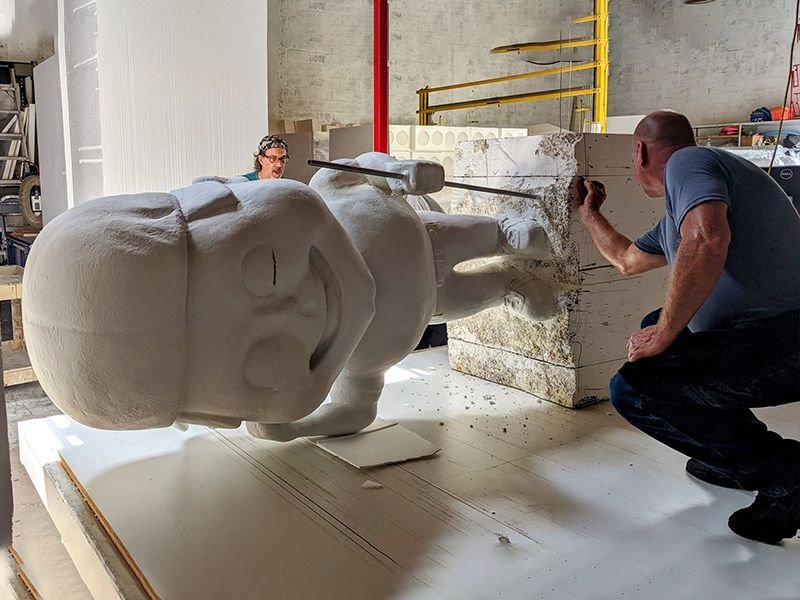 EPS expanded polystyrene foam being sculptured into a statue