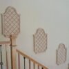 Foam custom geometric medallions inside on wall