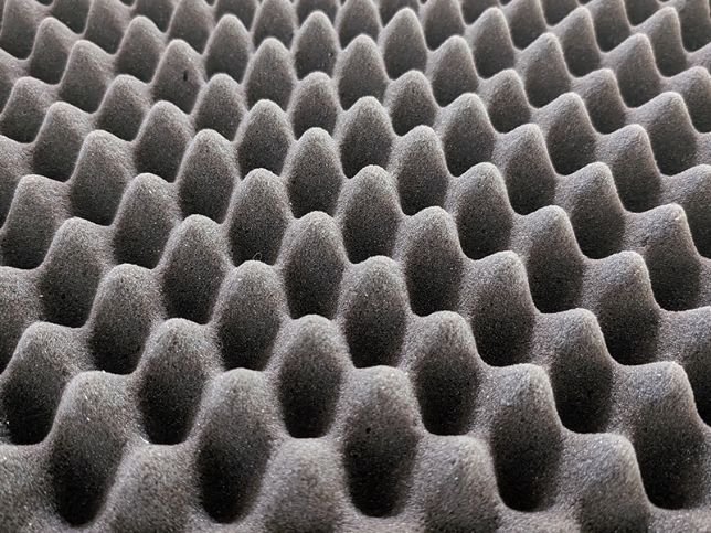 Gray polyurethane eggcrate convoluted foam for the top of cases