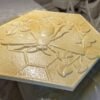 Manufacturing a foam spider medallion with urethane polyuria hard coat