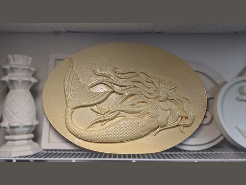 Ornamental embellishment foam medallion of a mermaid