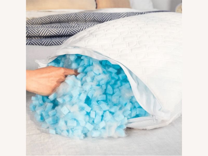 Shredded polyurethane PU foam coming out of pillow