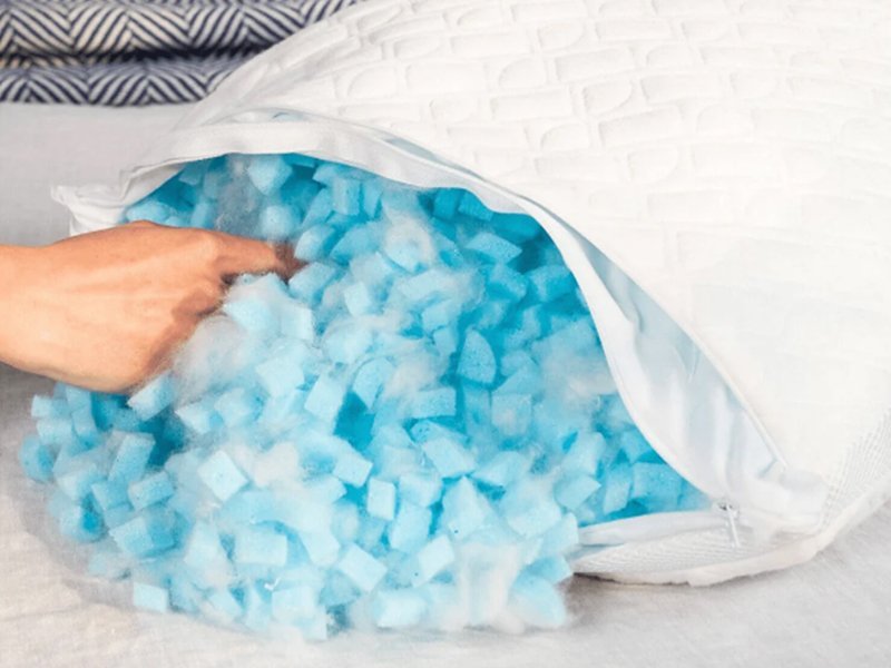 Shredded polyurethane PU foam coming out of pillow