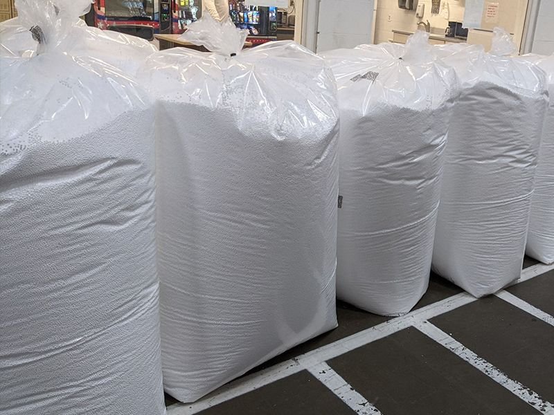 Wholesale bags of expanded polystyrene beads that are used for dirt and soil fill