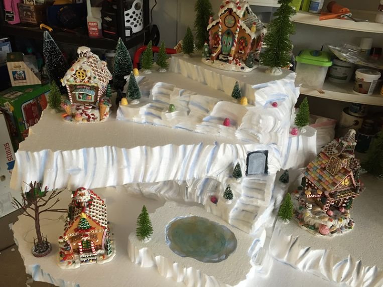 Winter village sitting on top of carved Styrofoam EPS foam