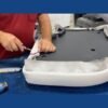 Worker manufacturing boat seat cushion
